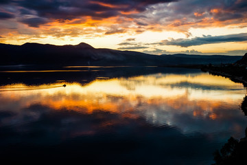 Fototapeta premium sunset over the lake in pigadakia, greece