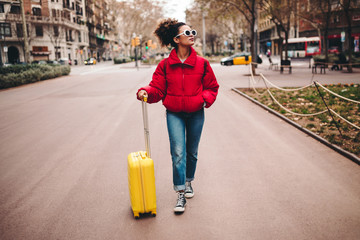 Young female tourist in the city streets