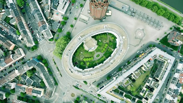 Aerial top down hyperlapse of a modern city buildings and road traffic