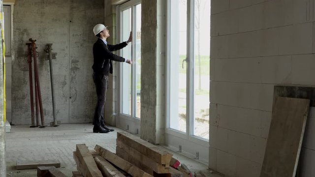 Architect inspects construction from the inside