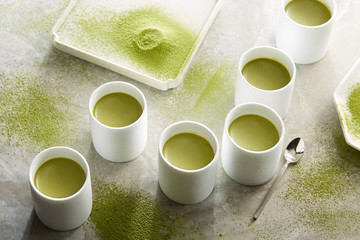 Matcha pudding cup, a sense of design arranged in the marble tabletop