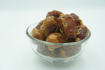 Kurma or dates fruits isolated on white background