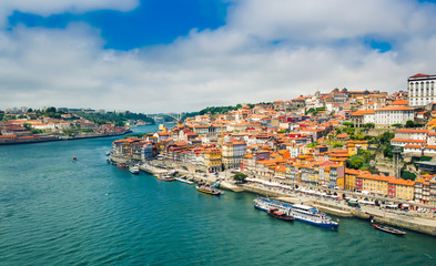 Naklejka na ściany i meble Porto, Portugal: Promenade in Cais de Ribeira along Duoro river in Porto old town
