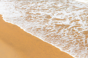 Stunning ocean sand beach with calm waves