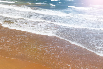 Stunning ocean sand beach with calm waves