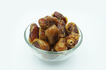 Kurma or dates fruits isolated on white background
