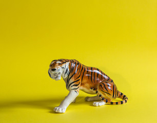 tiger on yellow background
