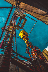 Drilling rig in oil field for drilled into subsurface in order to produced crude, inside view....