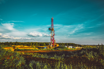 Land oil drilling rig blue sky