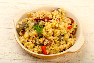 Bulgur with chicken hearts