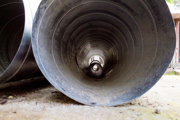 Old cylindrical object with another in its interior, building material