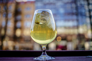 Cold refreshment glass of apple cider. Summer drink