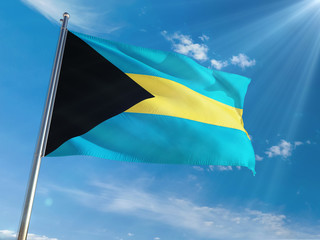 Bahamas National Flag Waving on pole against sunny blue sky background. High Definition