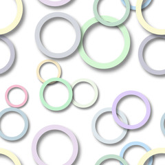 Abstract seamless pattern of randomly arranged colored rings with soft shadows on white background