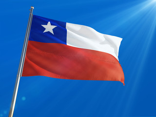 Chile National Flag Waving on pole against deep blue sky background. High Definition
