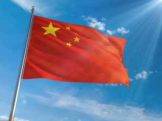 China National Flag Waving on pole against sunny blue sky background. High Definition