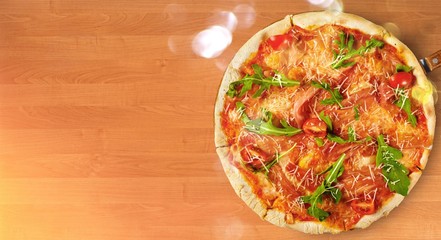 Freshly baked pizza on tray on white background, top view