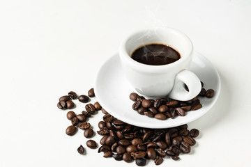Espresso coffee cup with coffee beans isolated on a white background
