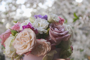 Bouquet of white and pink roses in a box 