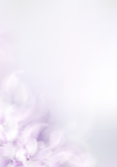 Soft spring background with purple blurred flower petals