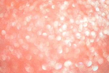 Bokeh blurred light pink coral party background, Christmas and New Year holidays background. Party...
