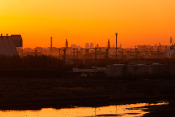  Polluting plants, ports at sunset