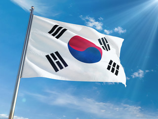 South Korea National Flag Waving on pole against sunny blue sky background. High Definition