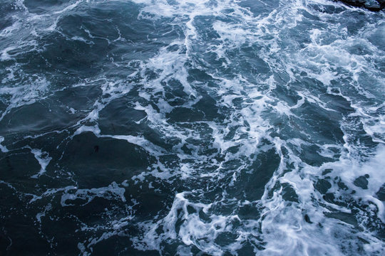 Dark blue nothern ocean waves in winter. Water surface © erosch