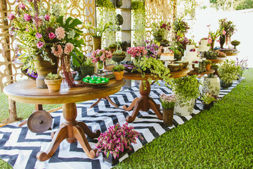 Wedding Setup. Cake tables with sweet, decoration and flowers 