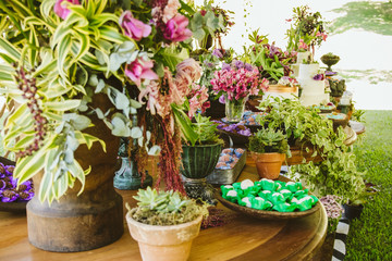 Wedding Setup. Cake tables with sweet, decoration and flowers 