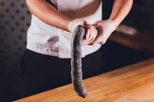 National Georgian Cuisine Khinkali. Senior Woman Prepares Khinkali. Top View Raw Meat Dough Dish Uncooked. Process Cooking Black Color.