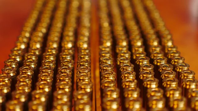 Tracking dolly shot of bullets or ammunition
