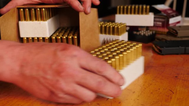 Unboxing ammunition rounds 
