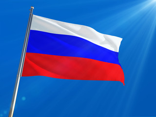 Fototapeta na wymiar Russia National Flag Waving on pole against deep blue sky background. High Definition