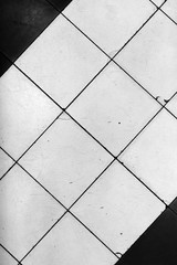 Black and white tile floor texture background