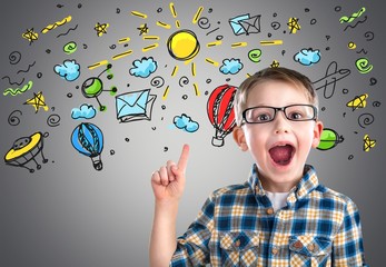 Portrait of a cute young boy with glasses isolated on  background. Studio shot.