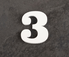 Number 3 - Blank figure on gray background. Top view