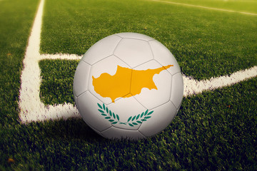 Cyprus ball on corner kick position, soccer field background. National football theme on green...