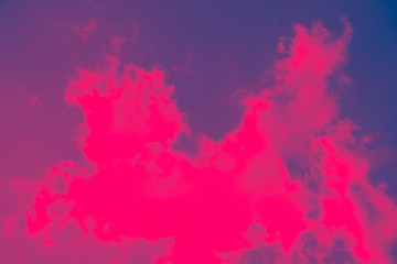 abstract pink background. Pink sky with white clouds.