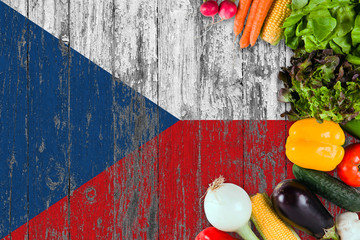 Fresh vegetables from Czech Republic on table. Cooking concept on wooden flag background.