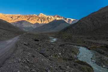 Andes valleys inside central Chile at Cajon del Maipo, Chile, amazing views over mountains, rivers and glaciers a perfect place for travel destination, hiking having some adventure on a remote place