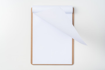white flipped paper on clipboard isolated on white