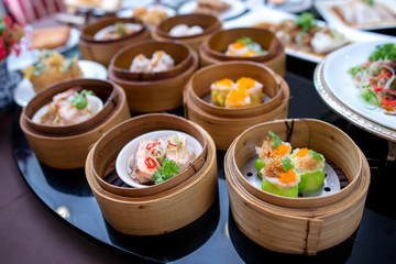 yumcha, dim sum in bamboo steamer, chinese cuisine