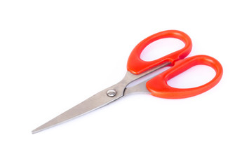 Red scissors isolated on white background