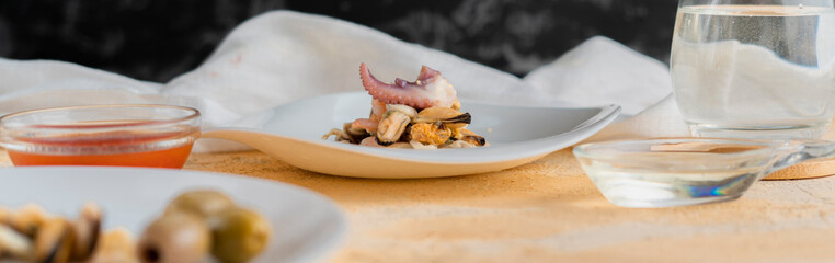 the process of serving fresh very delicious and spicy dish with the seafoods