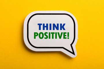 Think Positive Speech Bubble Isolated On Yellow Background