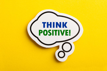 Think Positive Speech Bubble Isolated On Yellow Background
