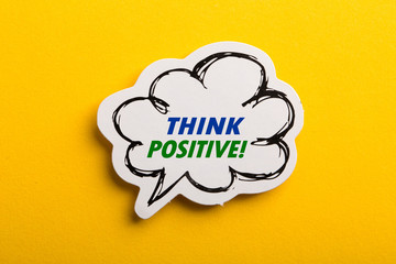 Think Positive Speech Bubble Isolated On Yellow Background