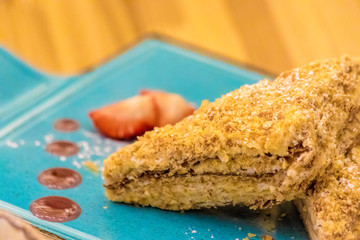 Tasty dessert - a classic Napoleon or millefeuille cake decorated with strawberries.