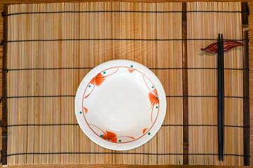 Placemat with plate and chopsticks (Japanese style)